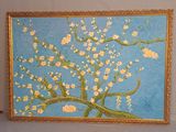 une photo d'un tableau représentant un arbre orné de fleurs