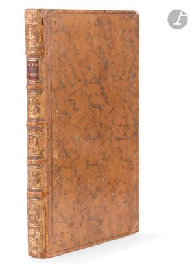 an old book sitting on top of a white surface next to a white background