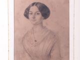 portrait of a woman in a white dress with a necklace and pearls
