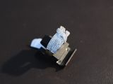 a small piece of metal that has been placed on a table