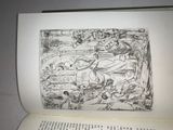 an open book with a drawing of a man and a cat