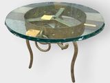 a glass table with a metal base and a glass top