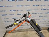 a small machine that is sitting in front of a wall