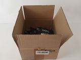 a cardboard box with a pair of scissors inside of it