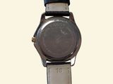 an image of a close up of a wrist watch on a white background