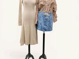 two mannequins that are standing next to each other