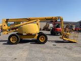 a yellow crane that is parked in a parking lot
