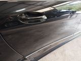 a close up of a car door handle and door handle