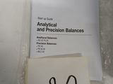 a piece of paper with the word analytical and precision balances written on it