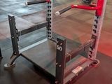 a gym with a lot of equipment in the room