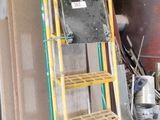 a ladder that is leaning against a wall