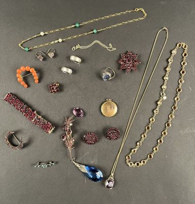 various necklaces and bracelets laid out on a table