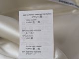 a label on a piece of cloth that says givenchy paris