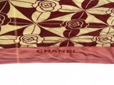 a picture of a chanel scarf on a white background