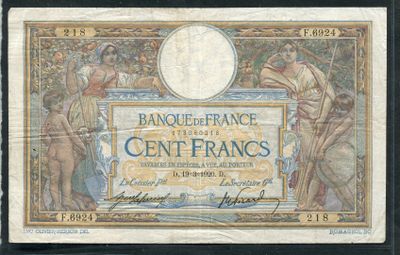 un gros plan d'un billet de banque sur lequel figure le portrait d'une femme