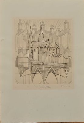 un vieux dessin représentant un château, posé sur une table dans une pièce