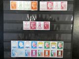 a picture of a display of stamps on a black wall