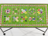 brightly colored mosaic tile coffee table with metal legs