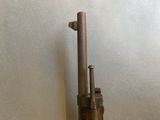 a gun that is sitting on top of a table