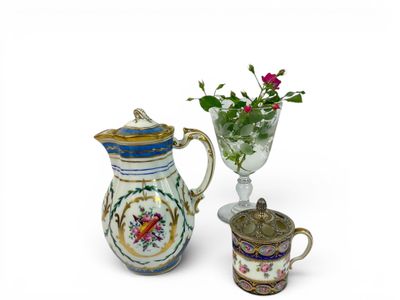 two vases that have flowers in them on the table