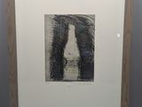 an image of a picture of a bottle of wine in a wooden frame