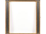 an old picture frame with a black and gold border