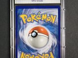 a close up of a pokemon card in a plastic case