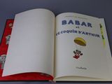 an open book with a picture of a person on a parachute