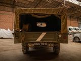 a military vehicle that is parked in a building
