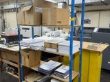a large room with a lot of boxes and boxes on the shelves