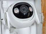an image of a security camera mounted on a wall next to a wooden wall