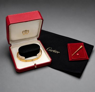 an image of a red box with a gold ring inside of it