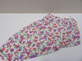 purple and red flowers on a white background with a pink and purple flowered top