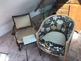two chairs and a table in the corner of a room