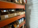 many boxes of food on the shelves in the warehouse