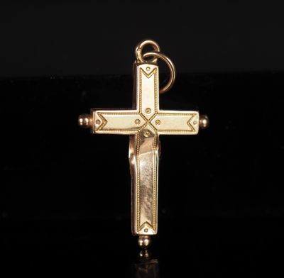 une croix dorée sur fond noir