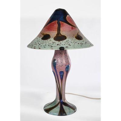 an image of a table lamp with a colorful shade on it