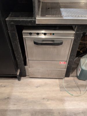 an image of a stainless steel dishwasher in a kitchen