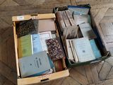 a box full of books sitting on the floor