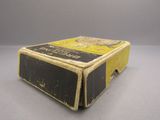 a box with a yellow and black label on it
