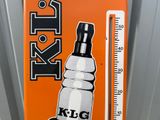 an orange sign with a thermometer on it