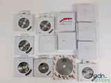 a lot of cd ' s sitting on a white table