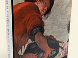 a book with a picture of a woman in a red dress
