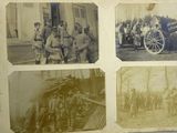 an old photo of a group of men standing around a horse drawn carriage