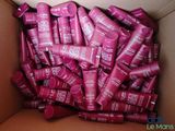 a box full of pink lip bales in it