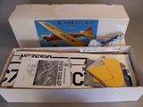 a cardboard box with a yellow plane inside of it