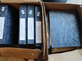 a box with a bunch of books inside of it