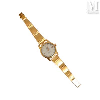 a close up of a gold wrist watch on a white background