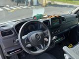 a dashboard of a car with a steering wheel and a dash board