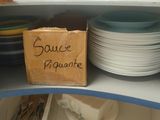 a box with a sign that says sauce propanete on it